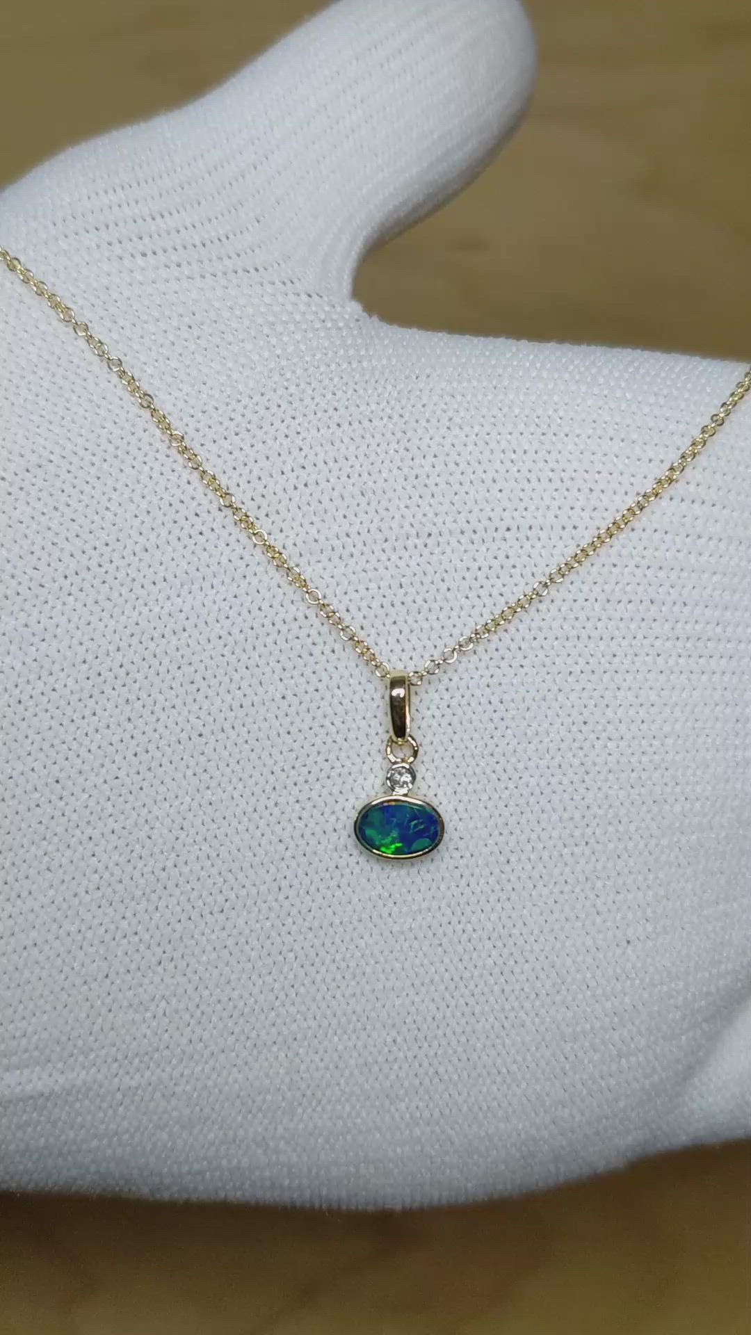 0.33 Ct. Blue Opal and Natural Diamond Bezel Pendant, 14K Yellow Gold Size Video
