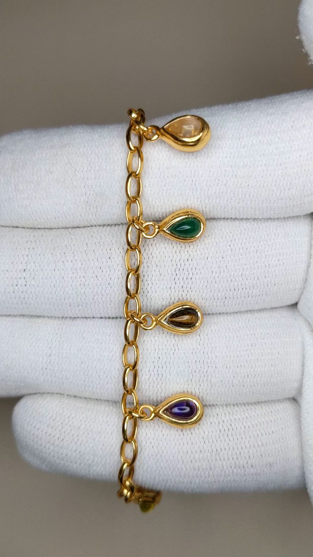 3.38&nbsp;Ct.Tw.Total Carat Weight Tiger's Eye, Moonstone, Ruby, Sapphire, Garnet, Peridot and Amethyst Bezel Bracelet, 22K Gold Plated Silver Size Video