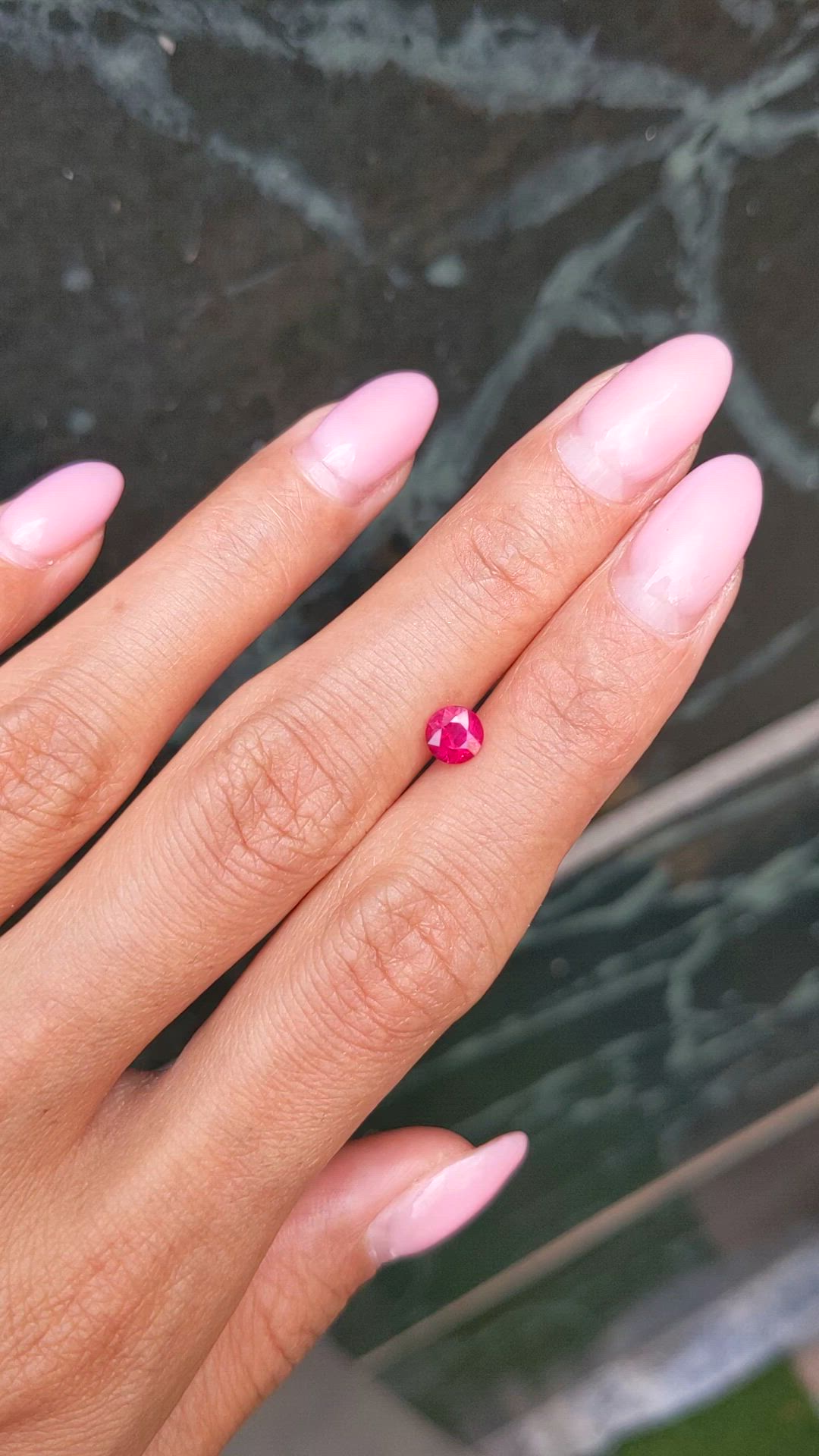 0.63 Ct. Pinkish Red Ruby from Burma (Myanmar) Size Video