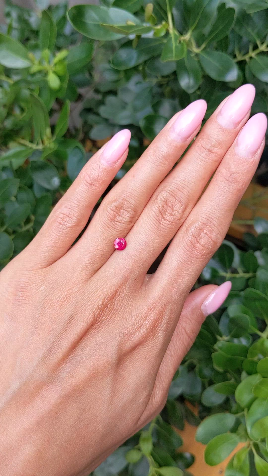 0.63 Ct. Pinkish Red Ruby from Burma (Myanmar) Size Video