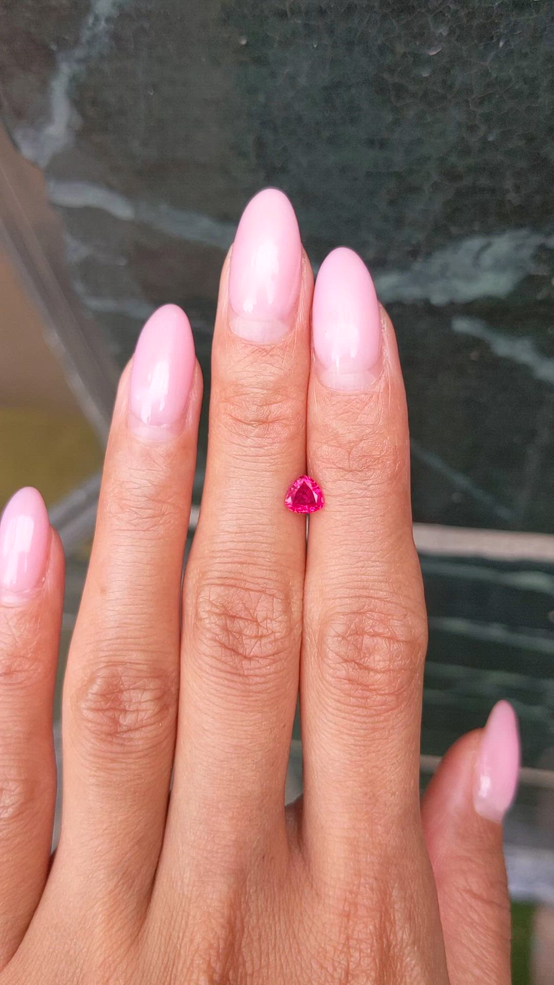 0.56 Ct. Pinkish Red Ruby from Burma (Myanmar) Size Video
