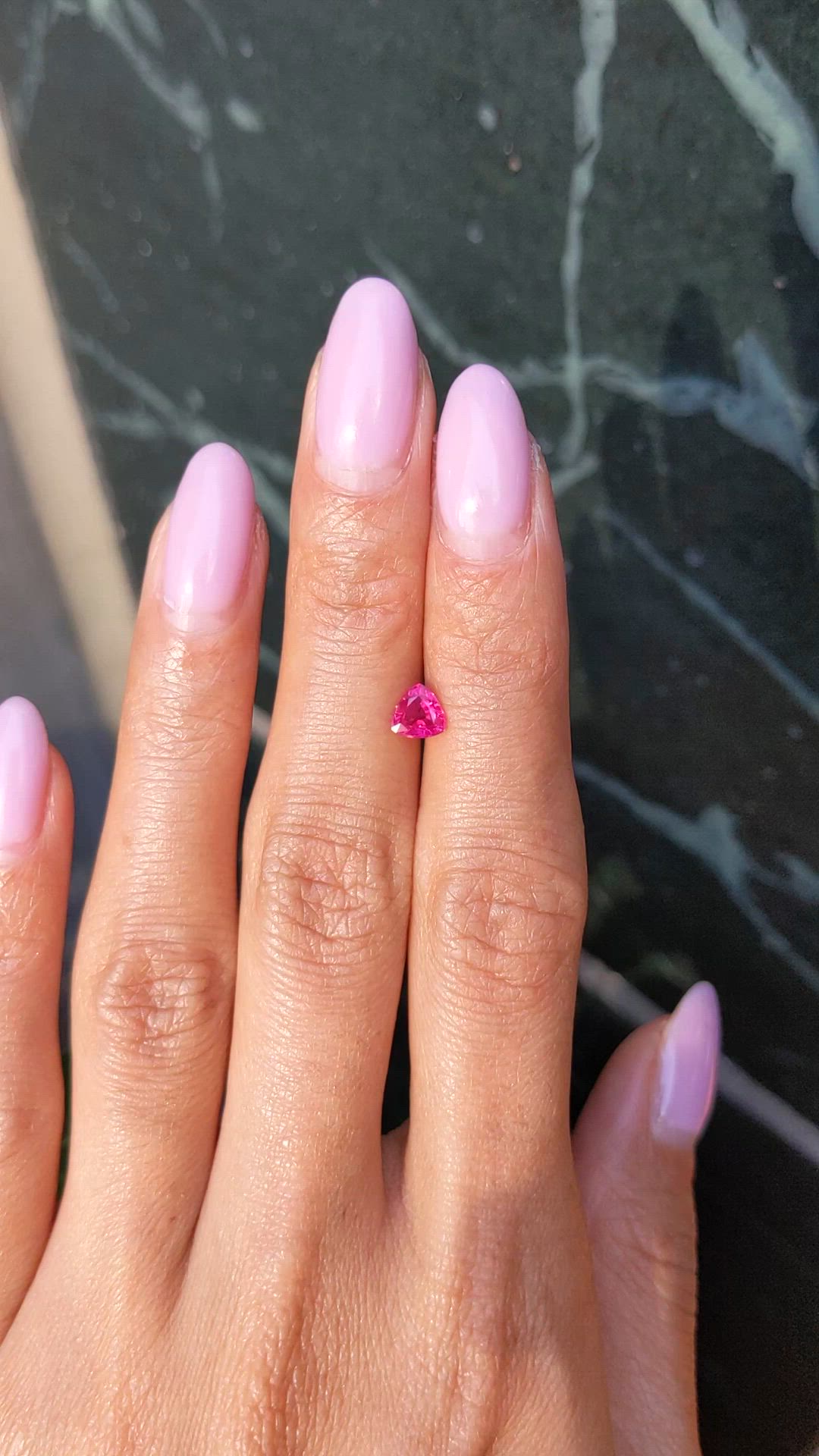 0.56 Ct. Pinkish Red Ruby from Burma (Myanmar) Size Video