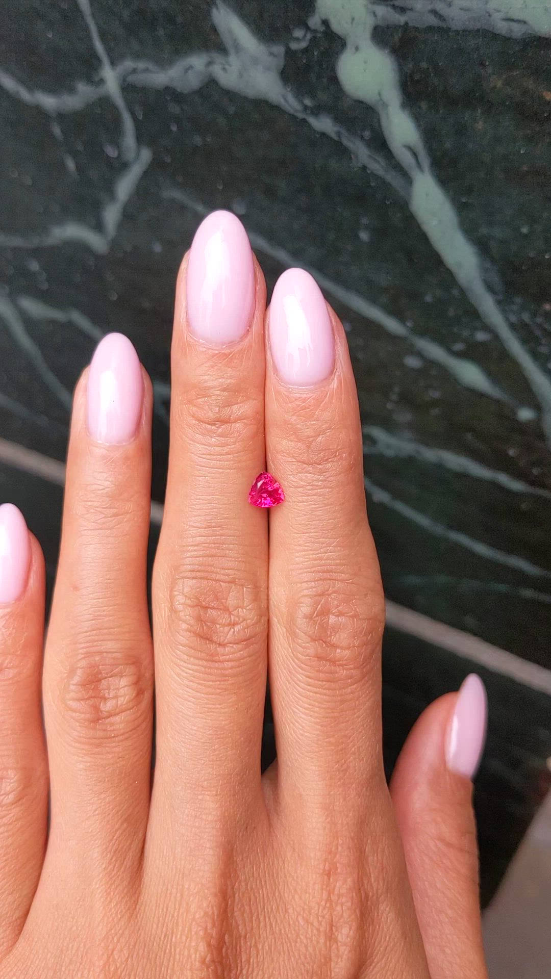 0.57 Ct. Pinkish Red Ruby from Burma (Myanmar) Size Video