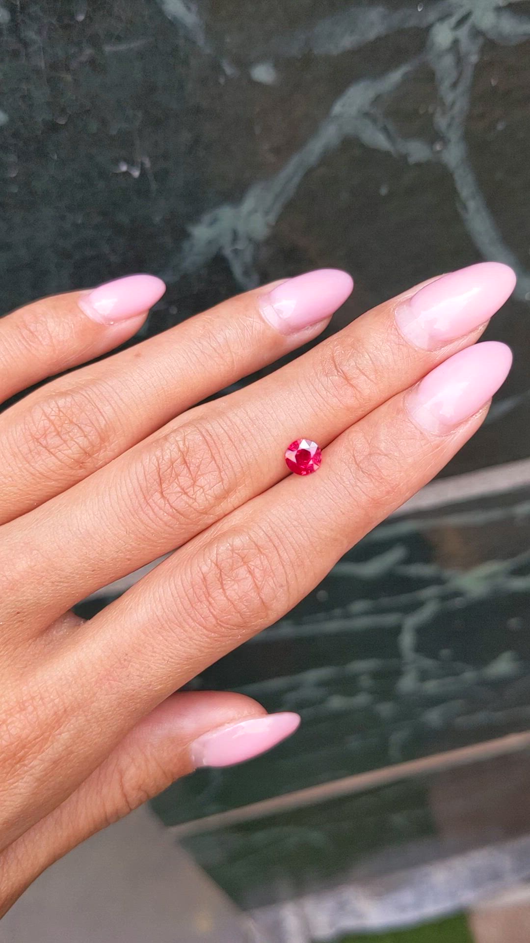0.58 Ct. Pinkish Red Ruby from Burma (Myanmar) Size Video