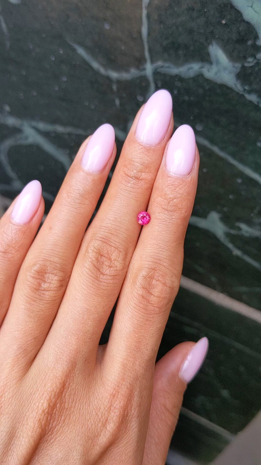 0.39 Ct. Pinkish Red Ruby from Mozambique Size Video