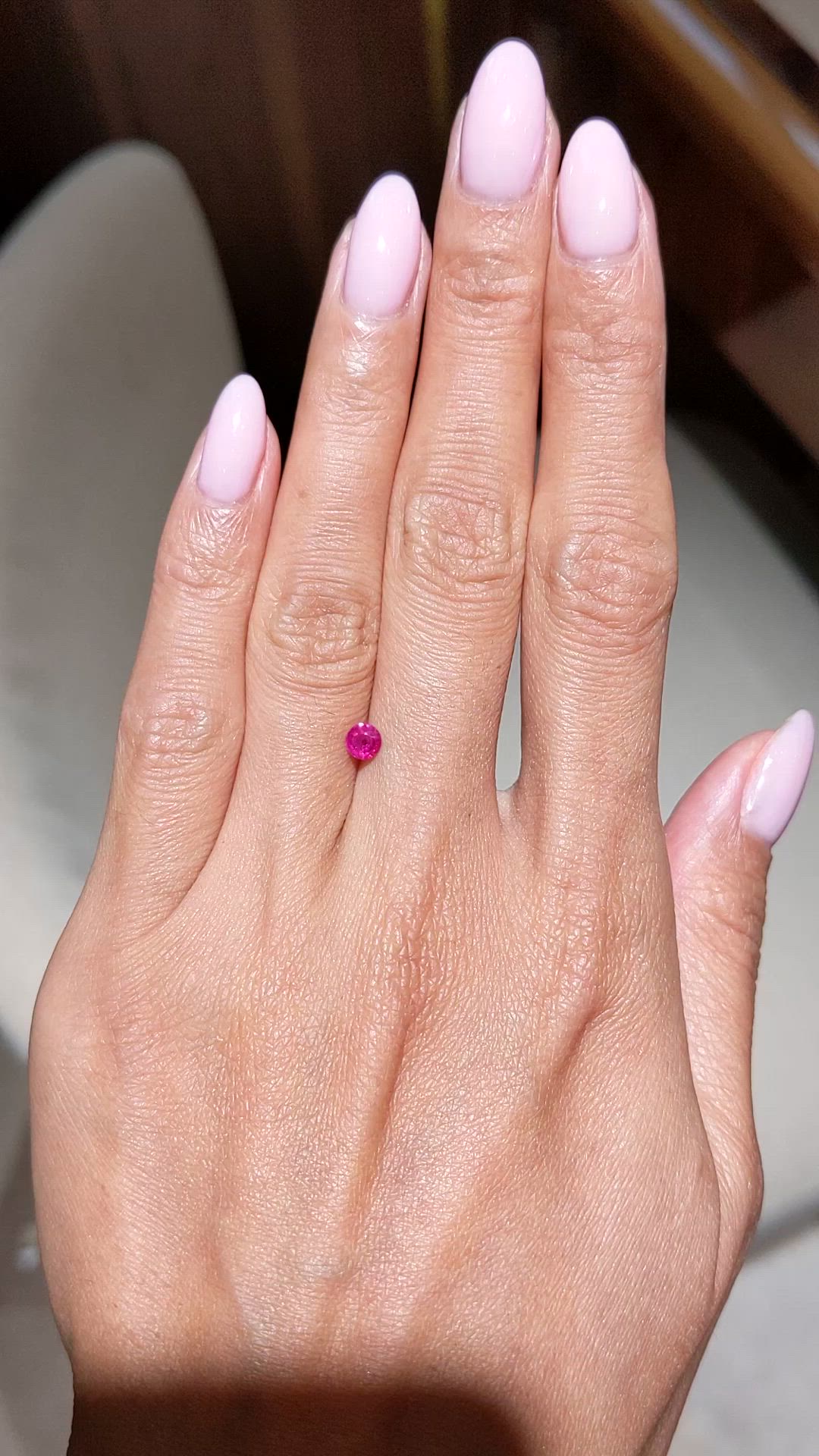 0.31 Ct. Pinkish Red Ruby from Mozambique Size Video
