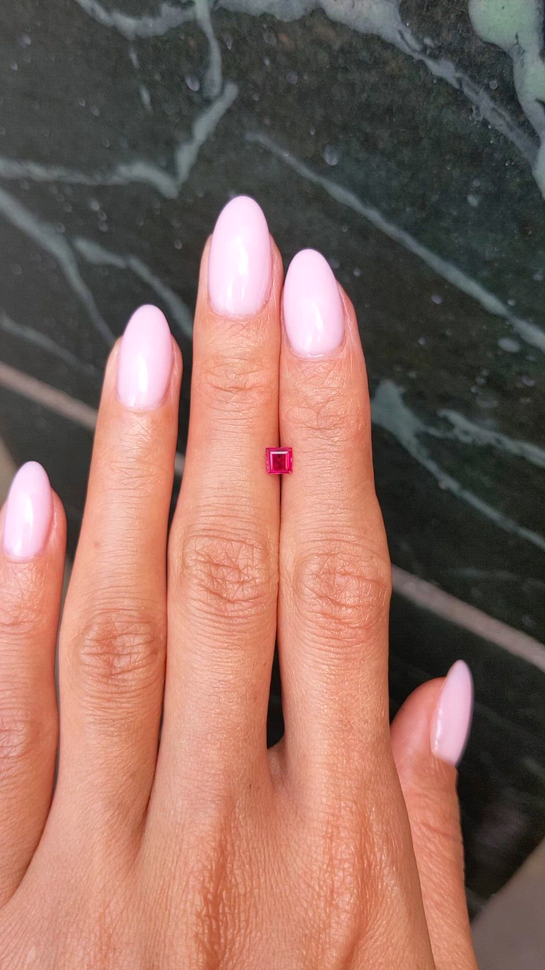 0.37 Ct. Pinkish Red Ruby from Mozambique Size Video