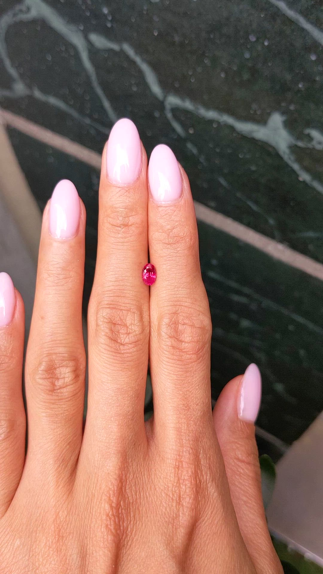0.55 Ct. Pinkish Red Ruby from Burma (Myanmar) Size Video