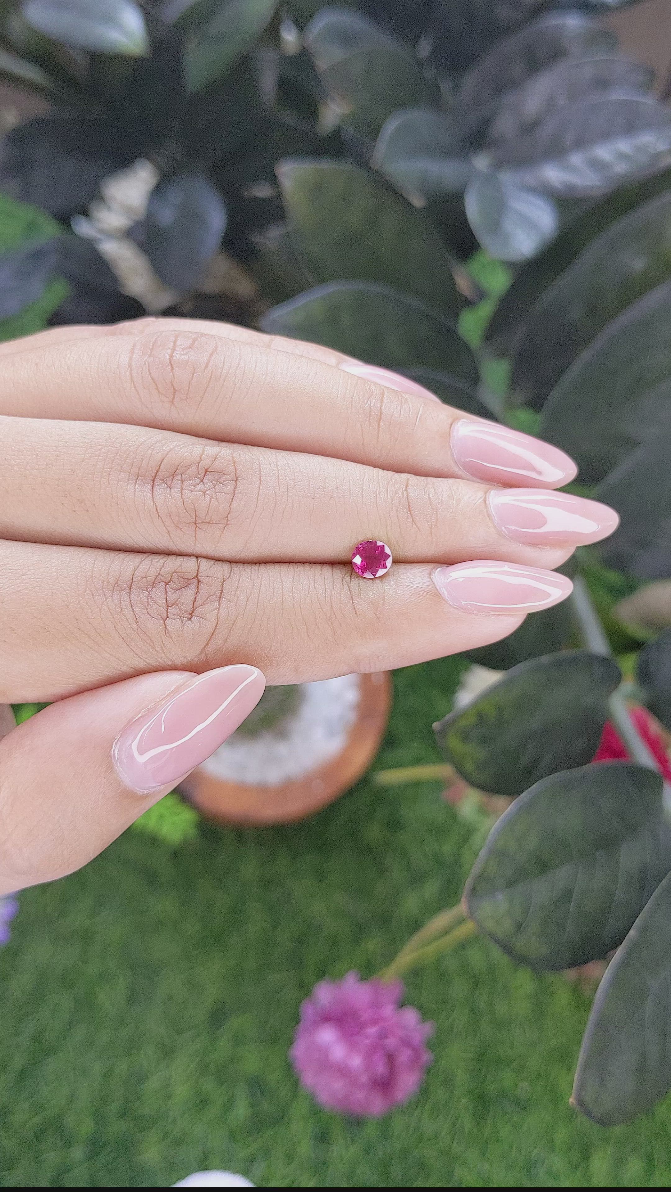 0.54 Ct. Pinkish Red Ruby from Mozambique Size Video
