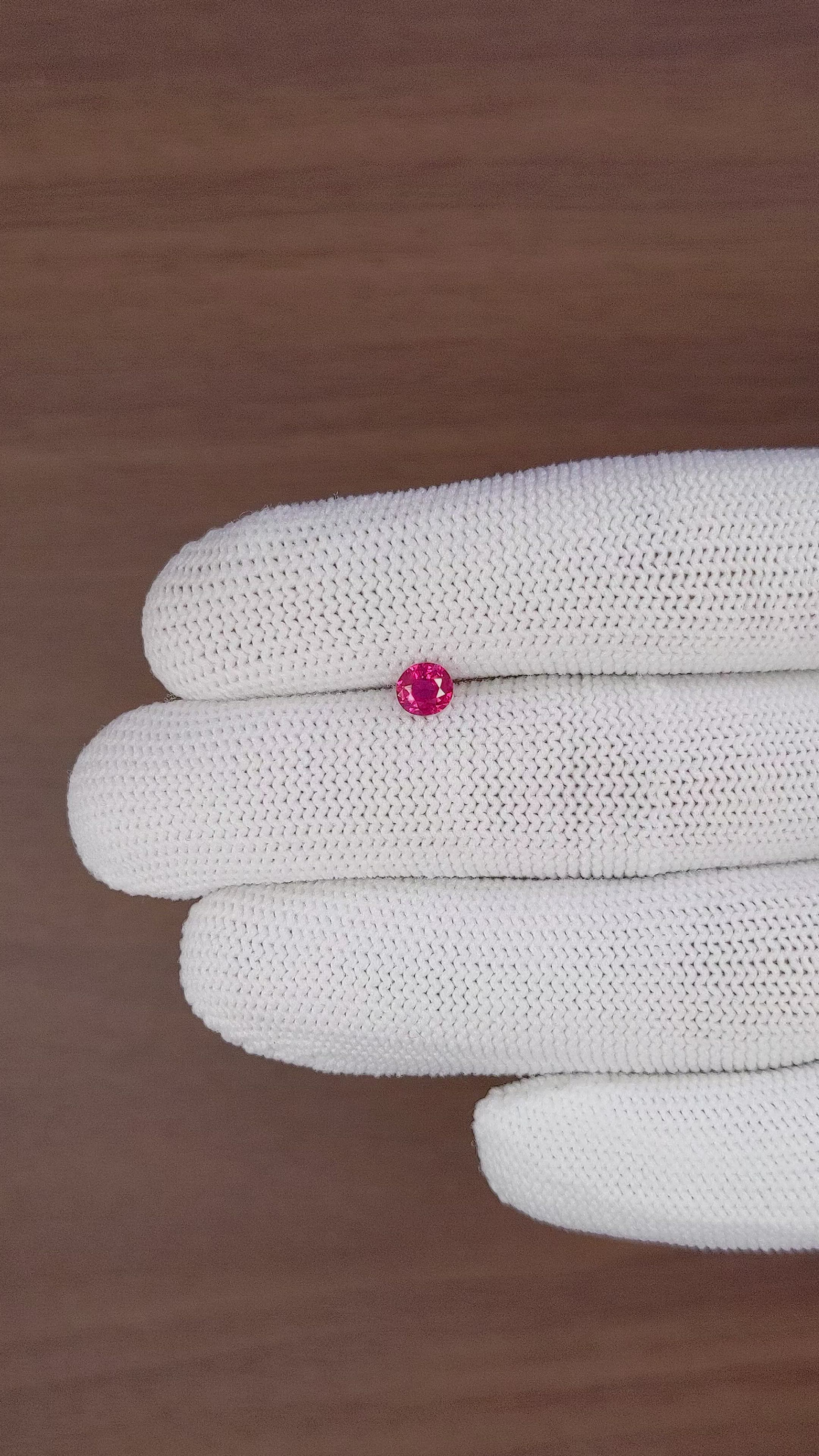 0.54 Ct. Pinkish Red Ruby from Mozambique Size Video