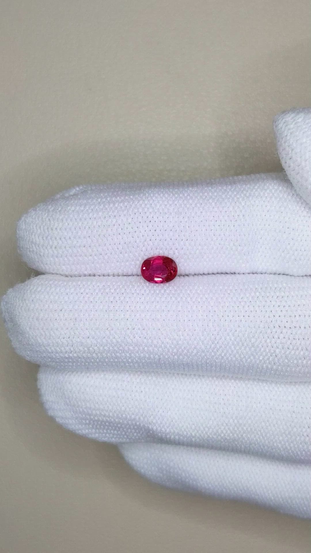 0.68 Ct. Pinkish Red Ruby from Mozambique Size Video