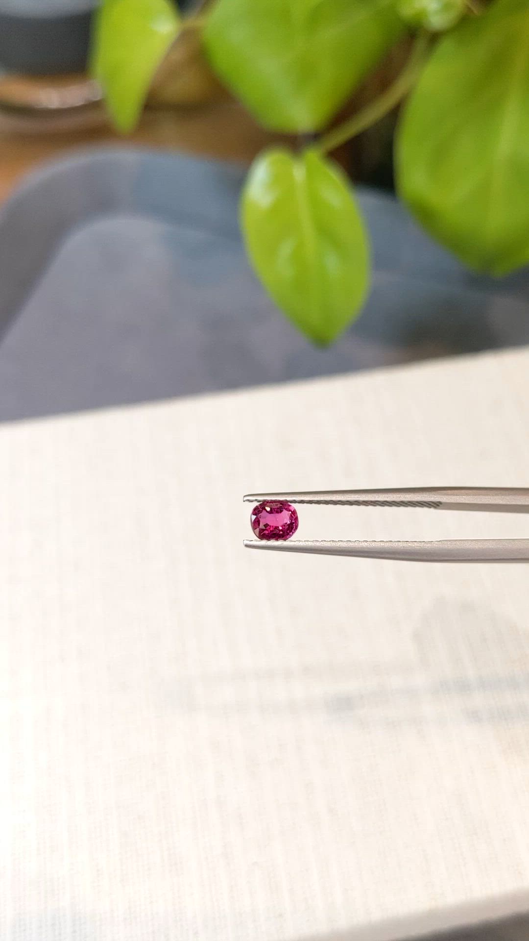 0.56 Ct. Pinkish Red Ruby from Mozambique Size Video