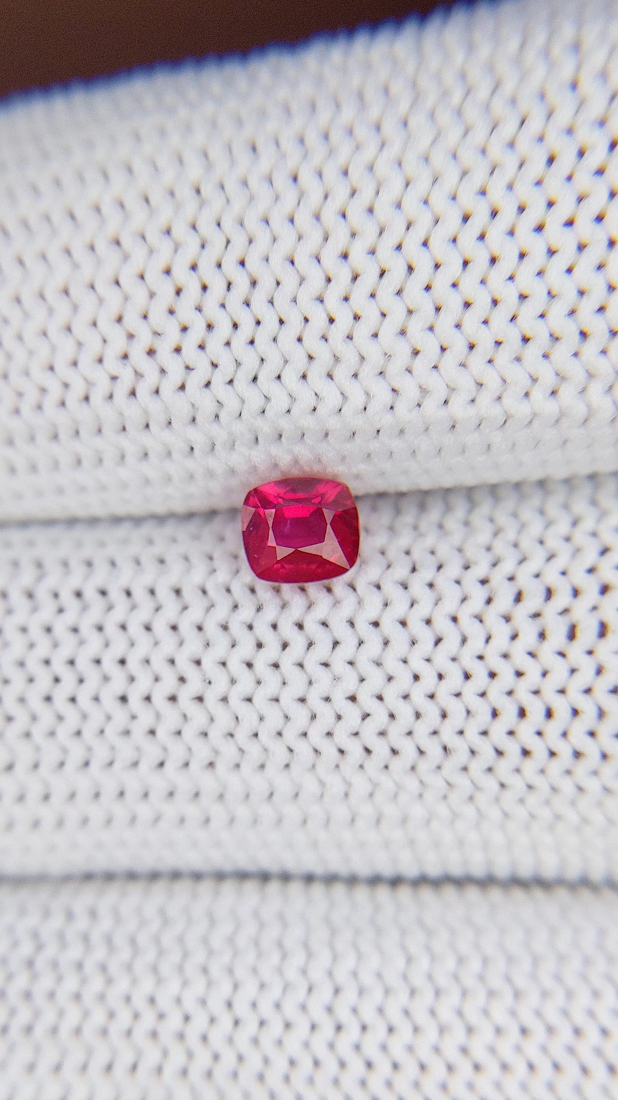 0.62 Ct. Pinkish Red Ruby from Mozambique Size Video