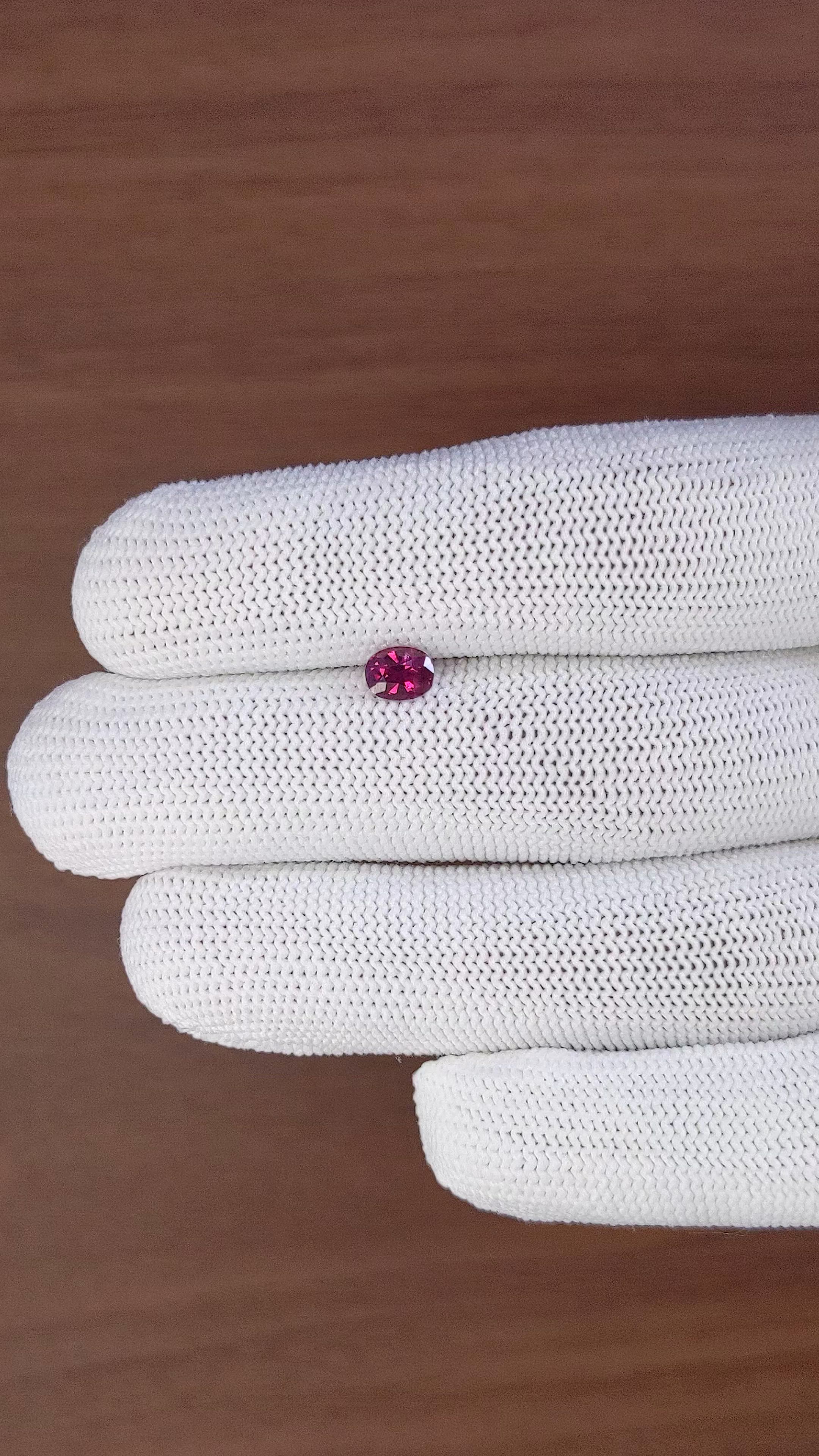 0.69 Ct. Pinkish Red Ruby from Mozambique Size Video