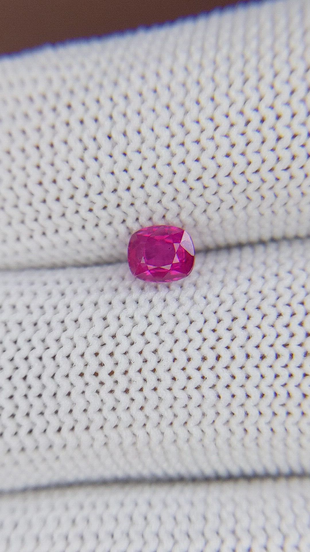 0.64 Ct. Pinkish Red Ruby from Mozambique Size Video