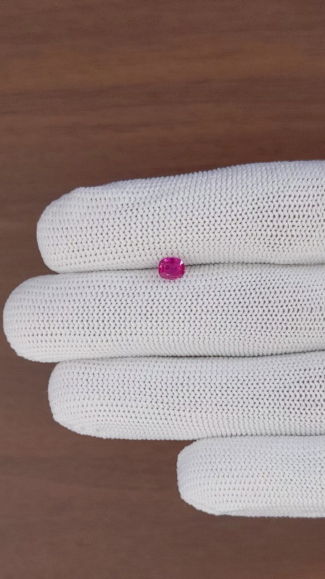 0.64 Ct. Pinkish Red Ruby from Mozambique Size Video