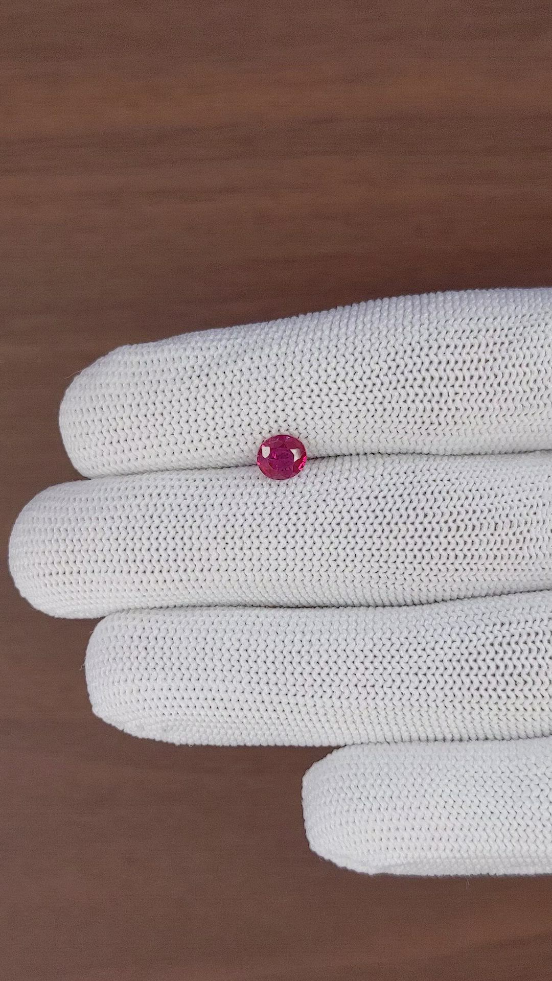 0.68 Ct. Pinkish Red Ruby from Mozambique Size Video