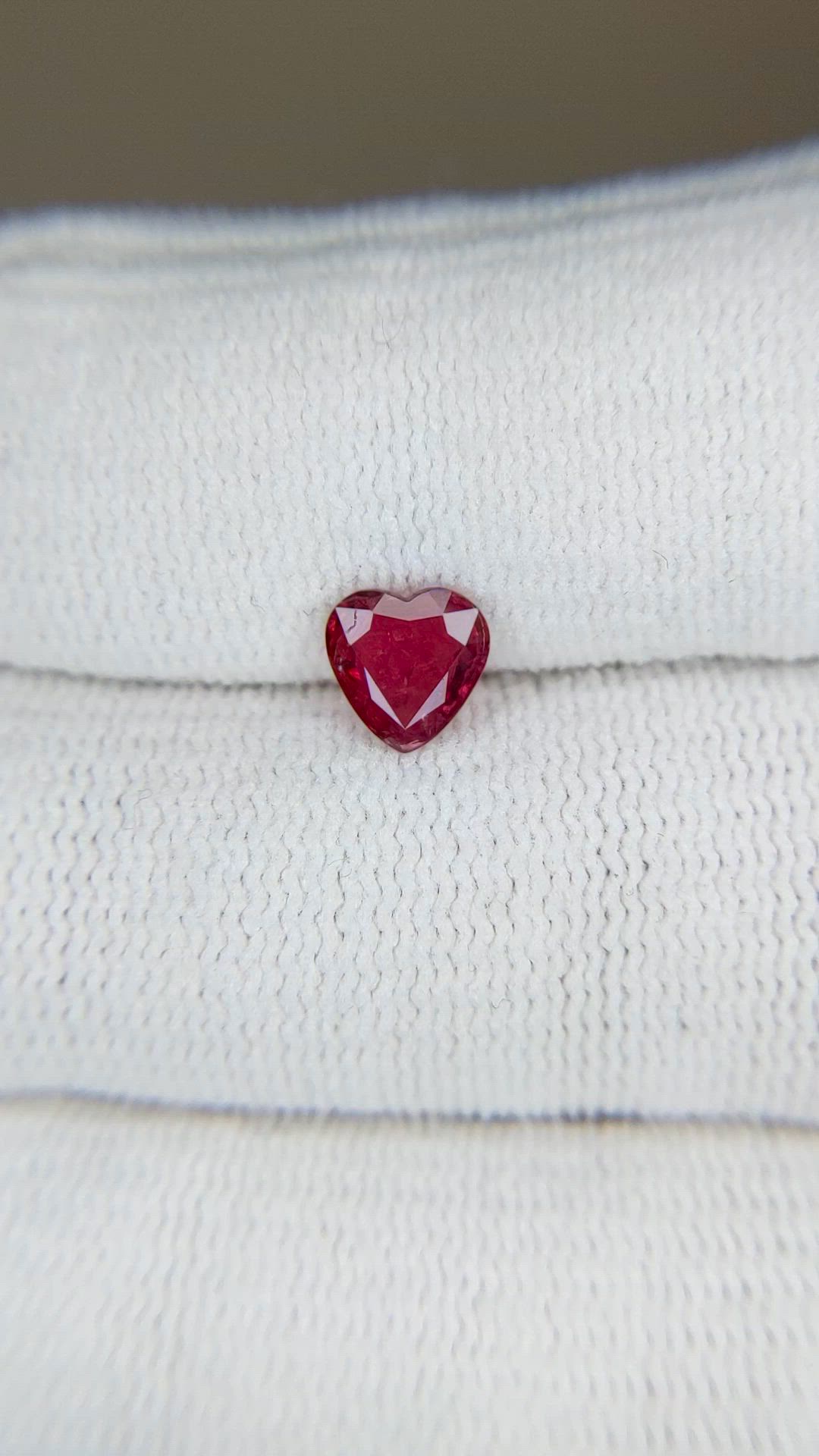 0.82 Ct. Pinkish Red Ruby from Thailand Size Video