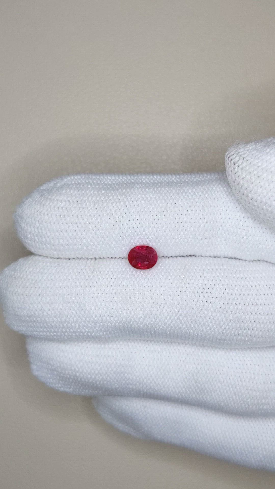0.79 Ct. Pinkish Red Ruby from Burma (Myanmar) Size Video