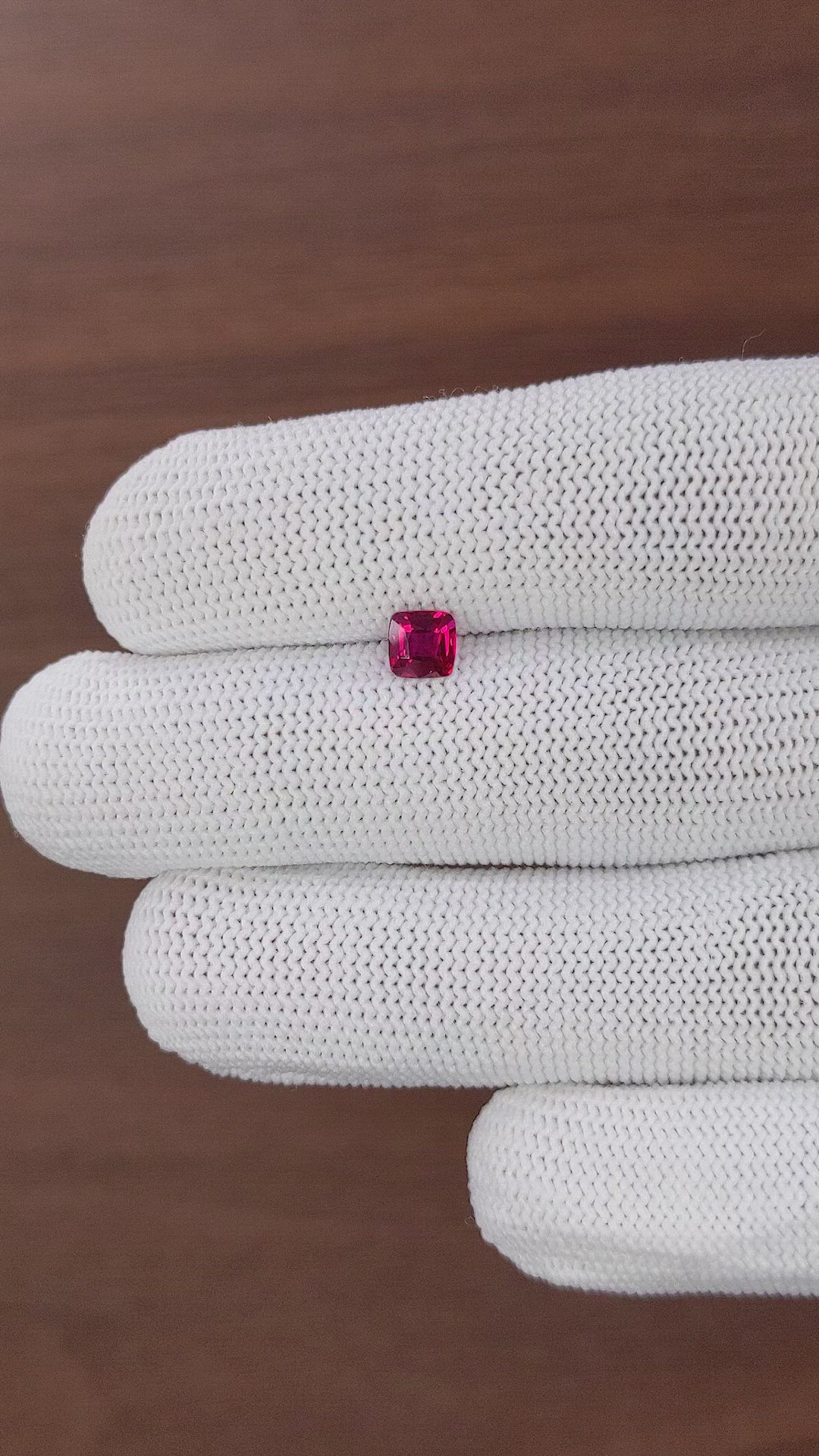 0.64 Ct. Pinkish Red Ruby from Madagascar Size Video