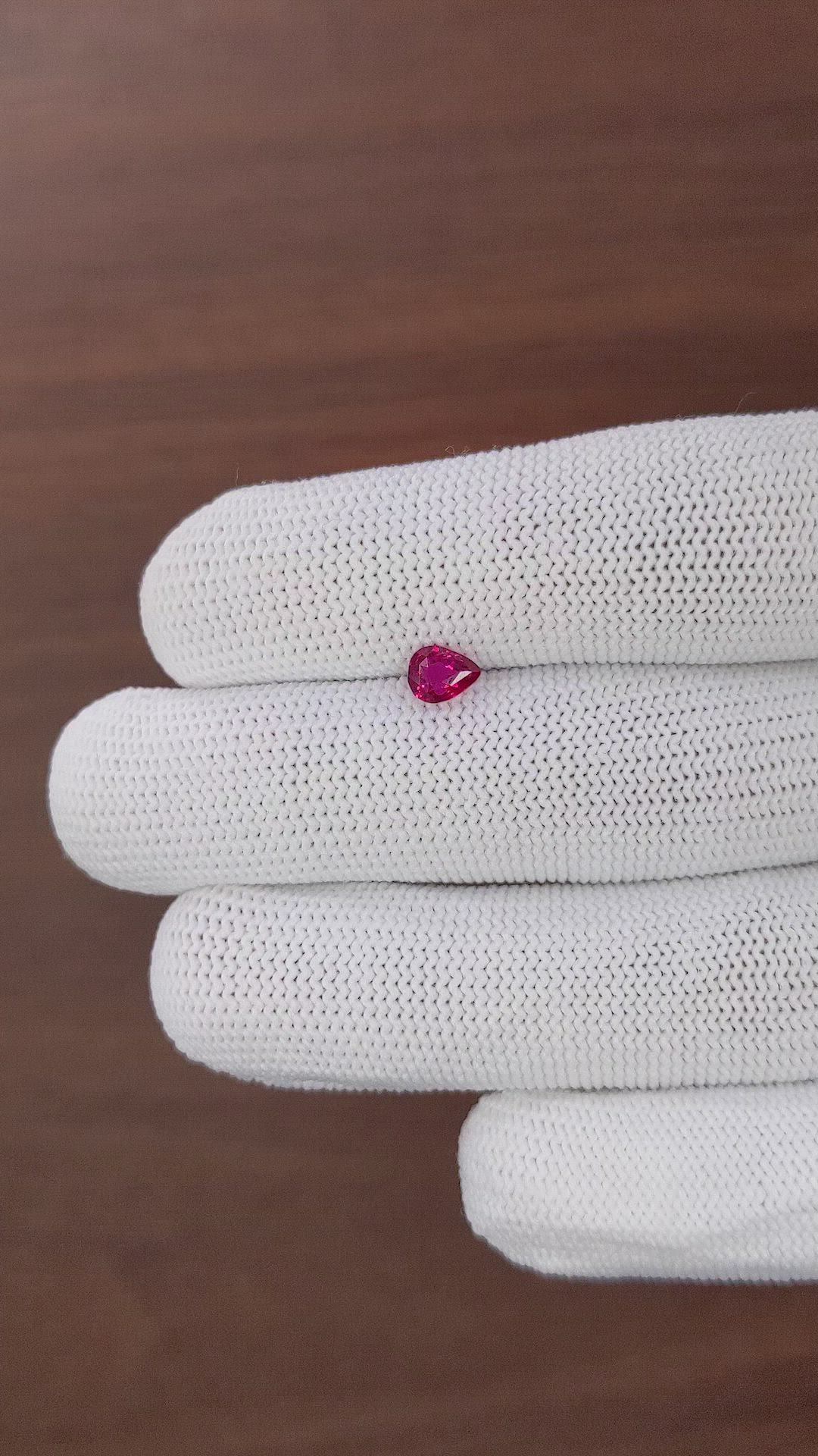 0.54 Ct. Pinkish Red Ruby from Tanzania Size Video