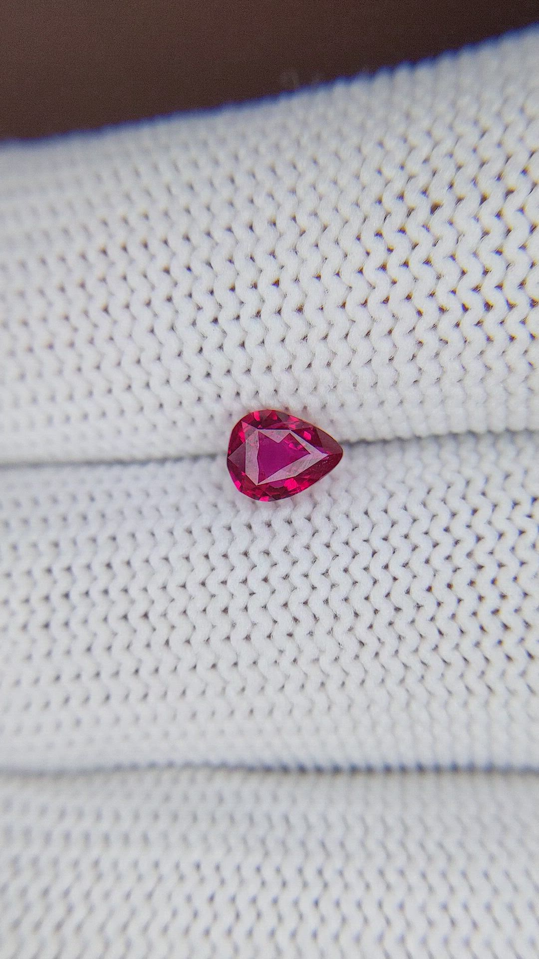 0.54 Ct. Pinkish Red Ruby from Tanzania Size Video