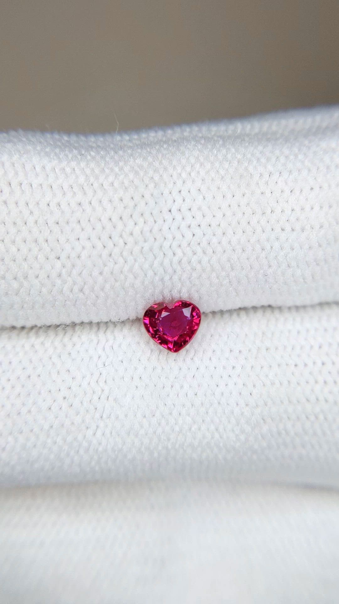 0.51 Ct. Pinkish Red Ruby from Mozambique Size Video