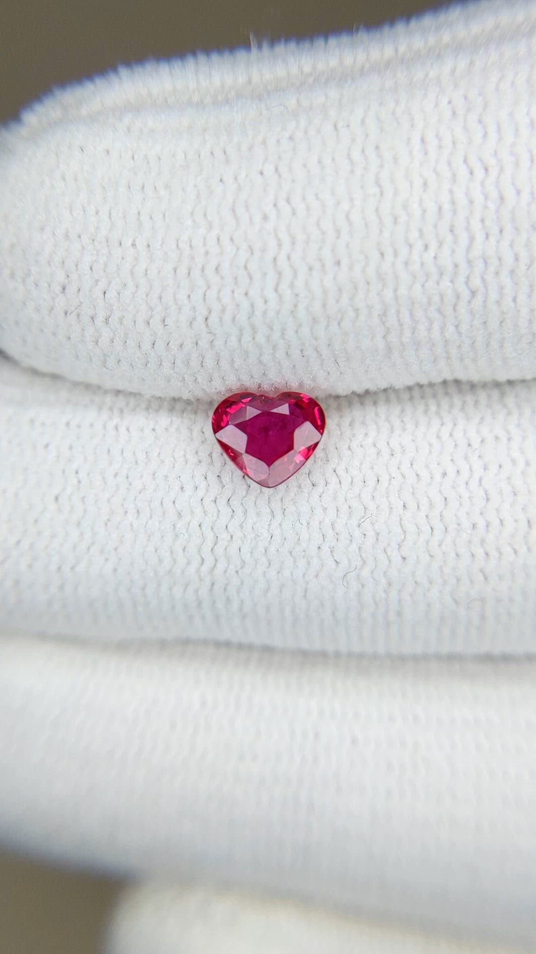 0.65 Ct. Pinkish Red Ruby from Mozambique Size Video