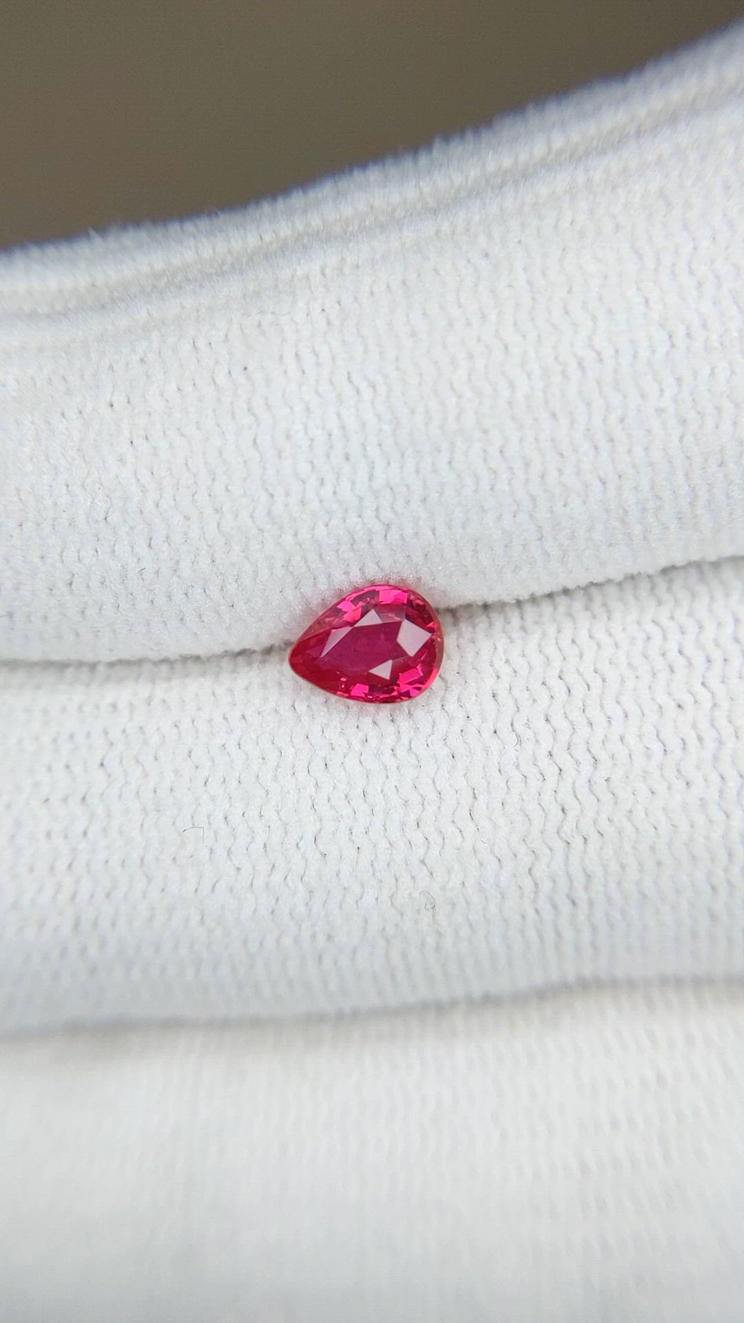 0.77 Ct. Pinkish Red Ruby from Mozambique Size Video