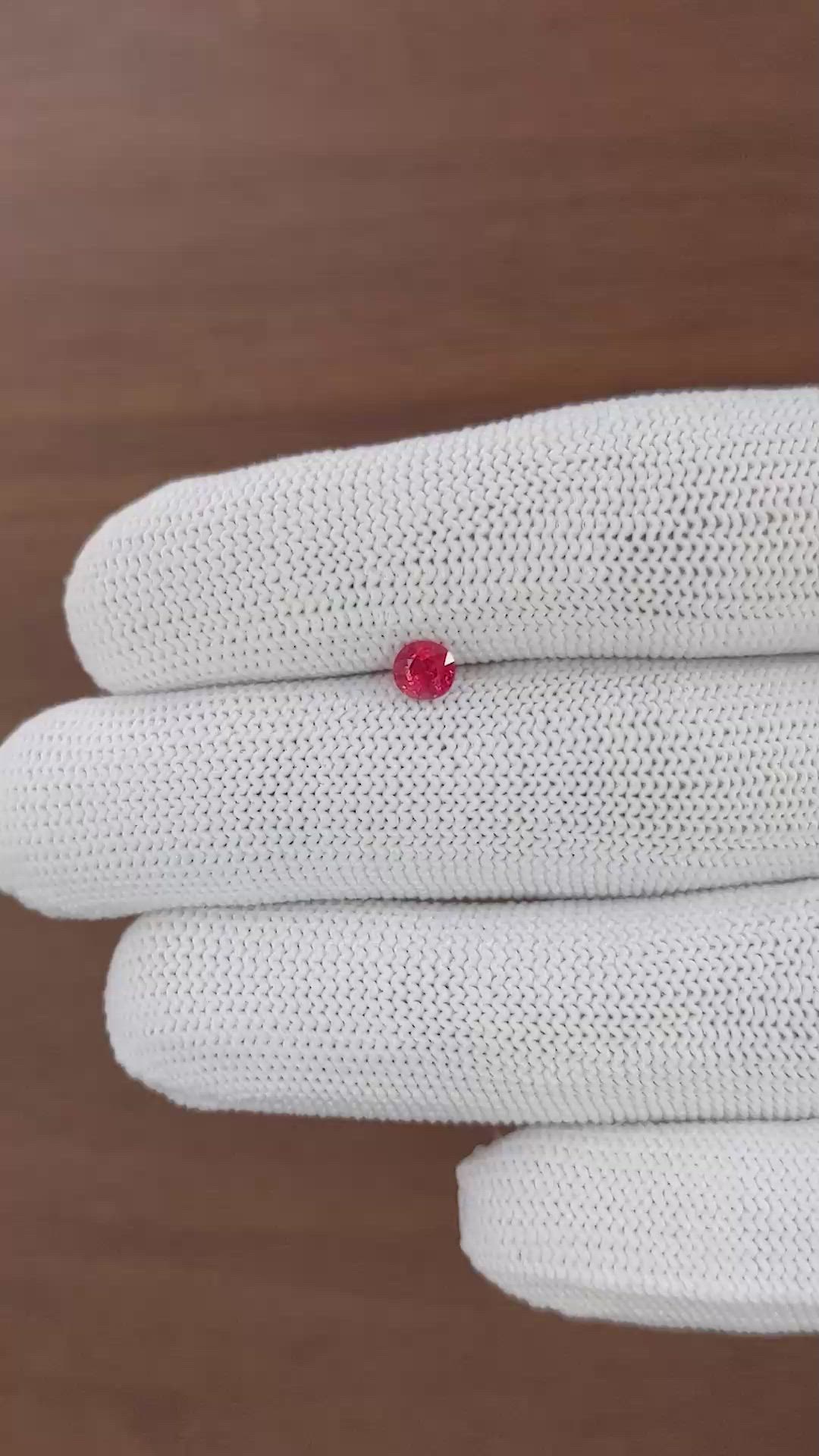 0.49 Ct. Pinkish Red Ruby from Mozambique Size Video
