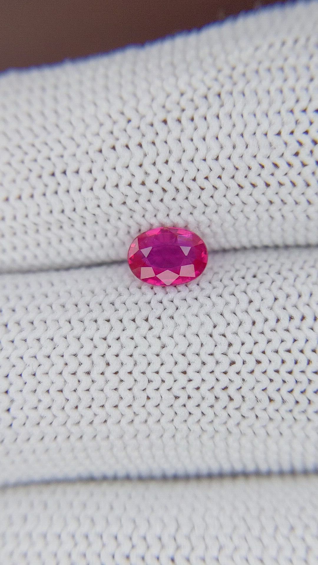 0.57 Ct. Pinkish Red Ruby from Mozambique Size Video