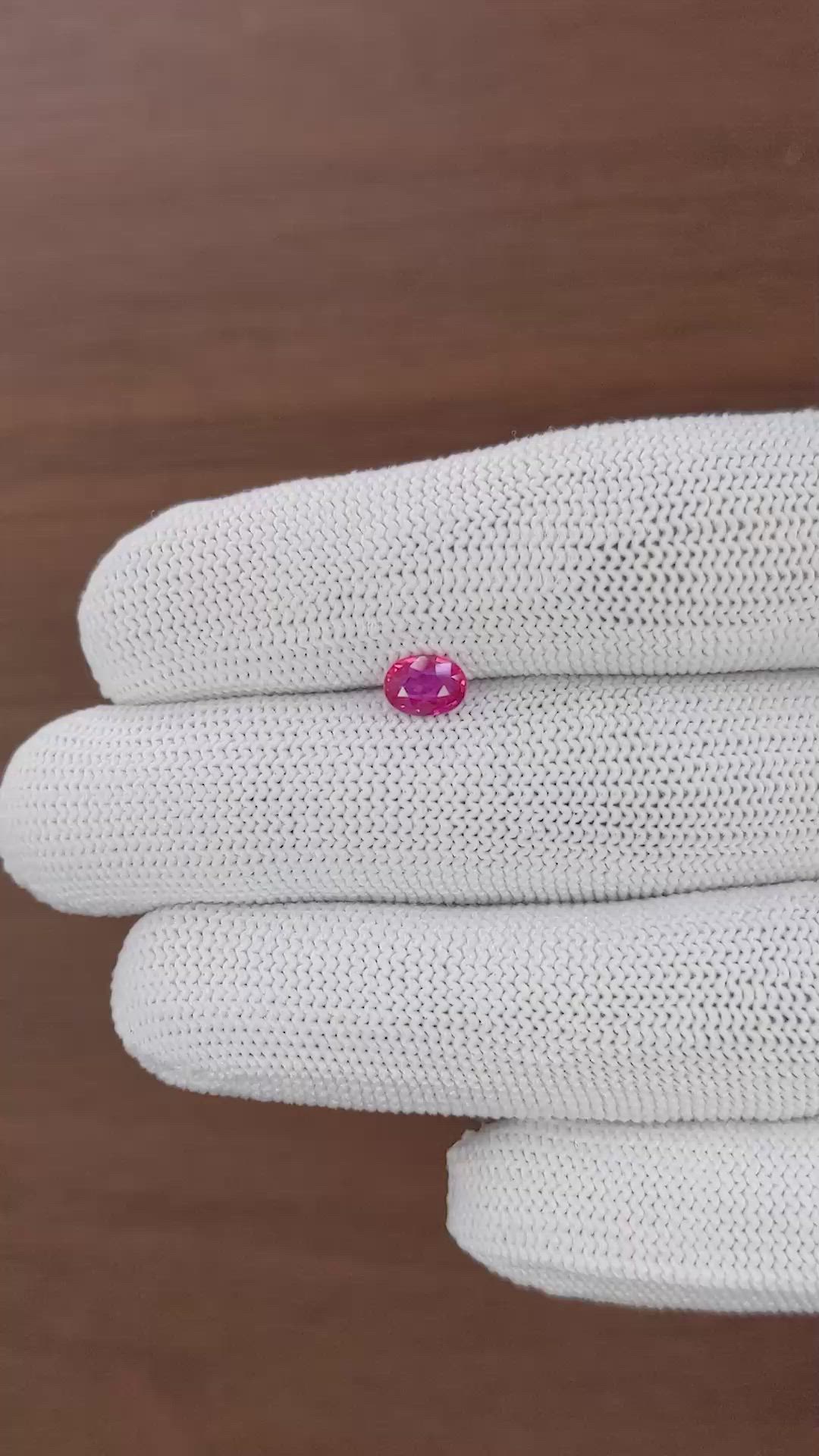 0.57 Ct. Pinkish Red Ruby from Mozambique Size Video