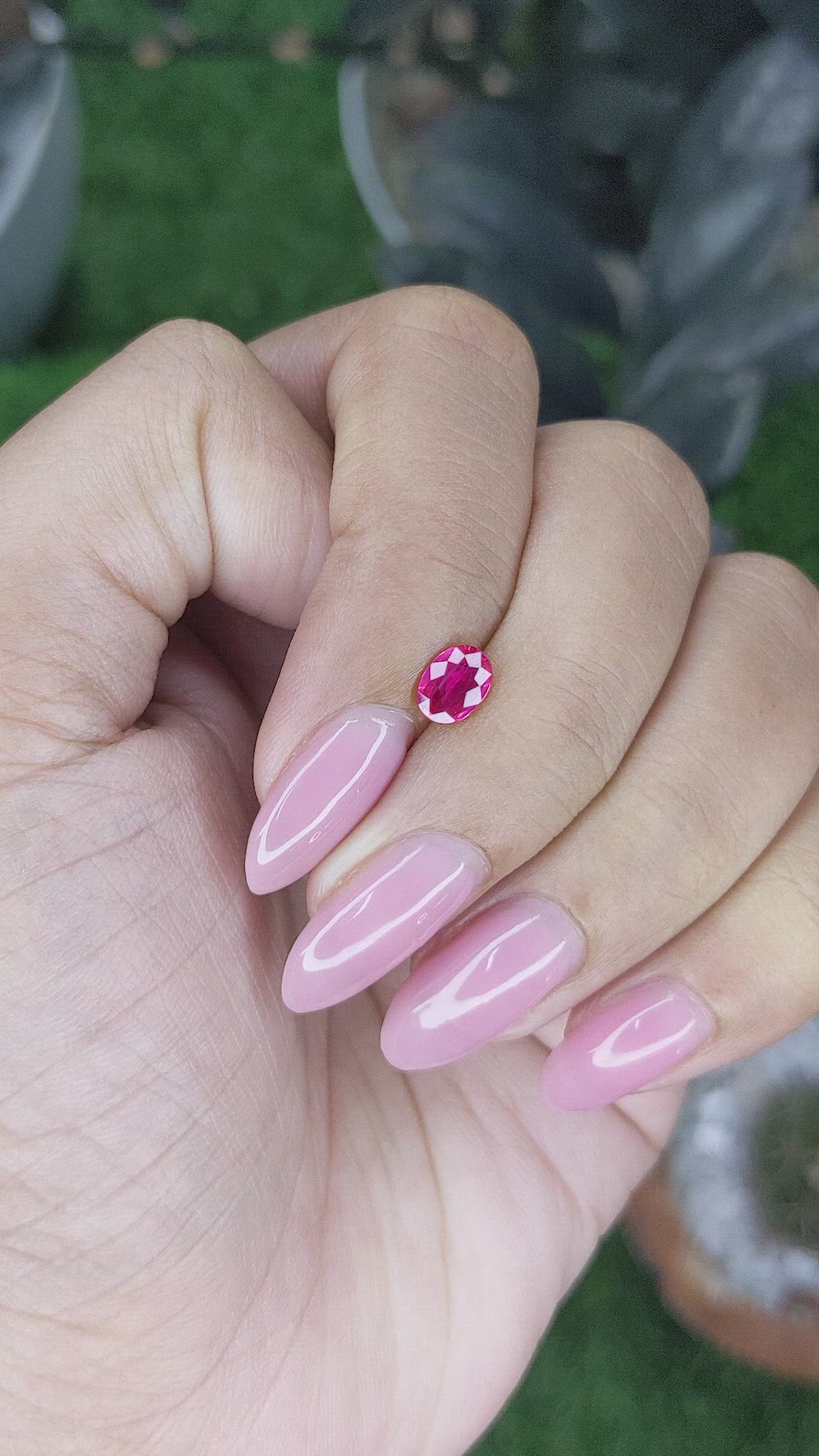 0.57 Ct. Pinkish Red Ruby from Mozambique Size Video