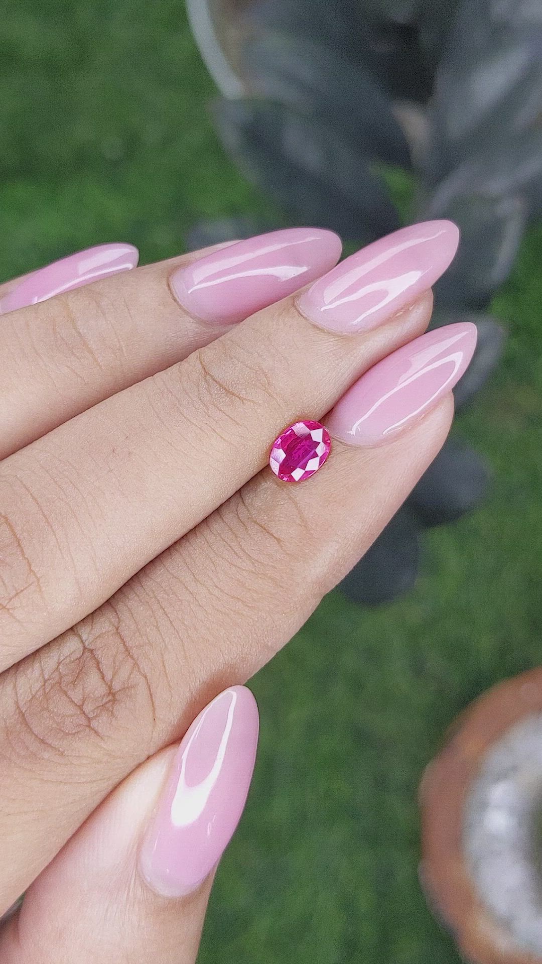 0.57 Ct. Pinkish Red Ruby from Mozambique Size Video