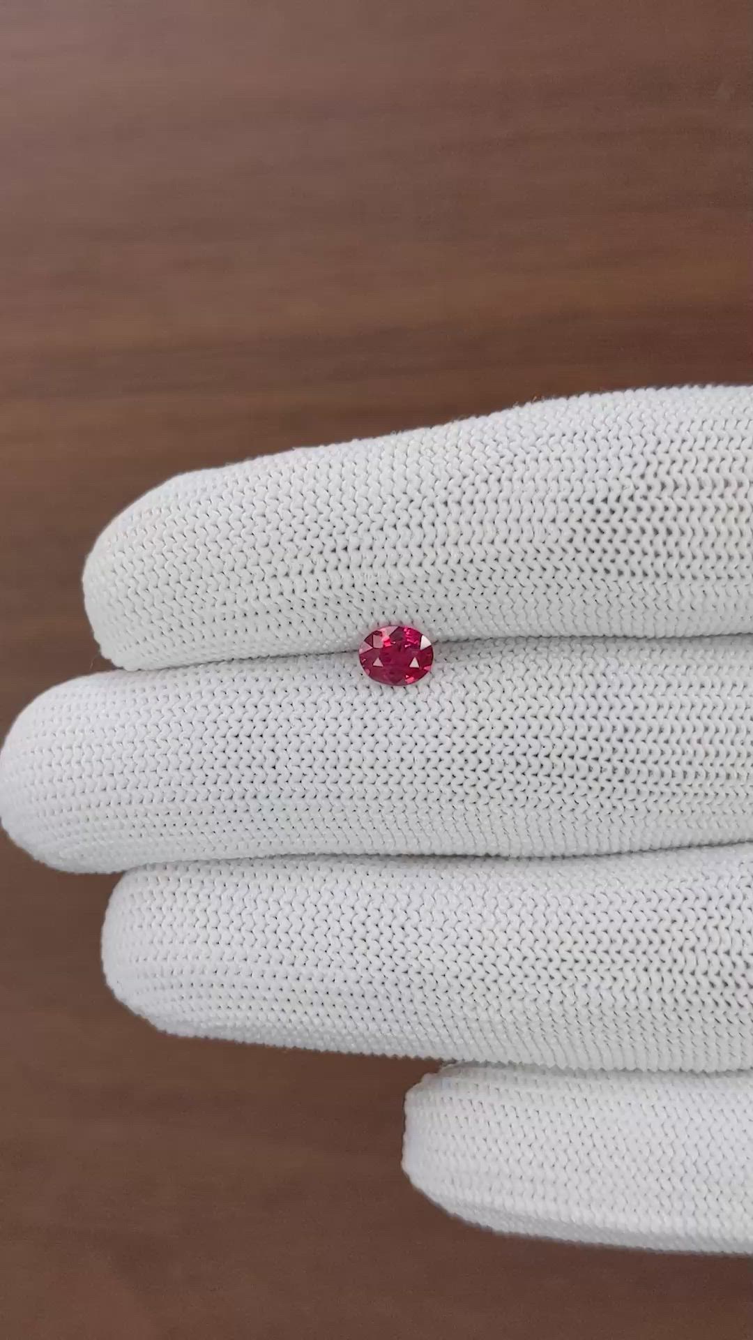 0.66 Ct. Pinkish Red Ruby from Mozambique Size Video