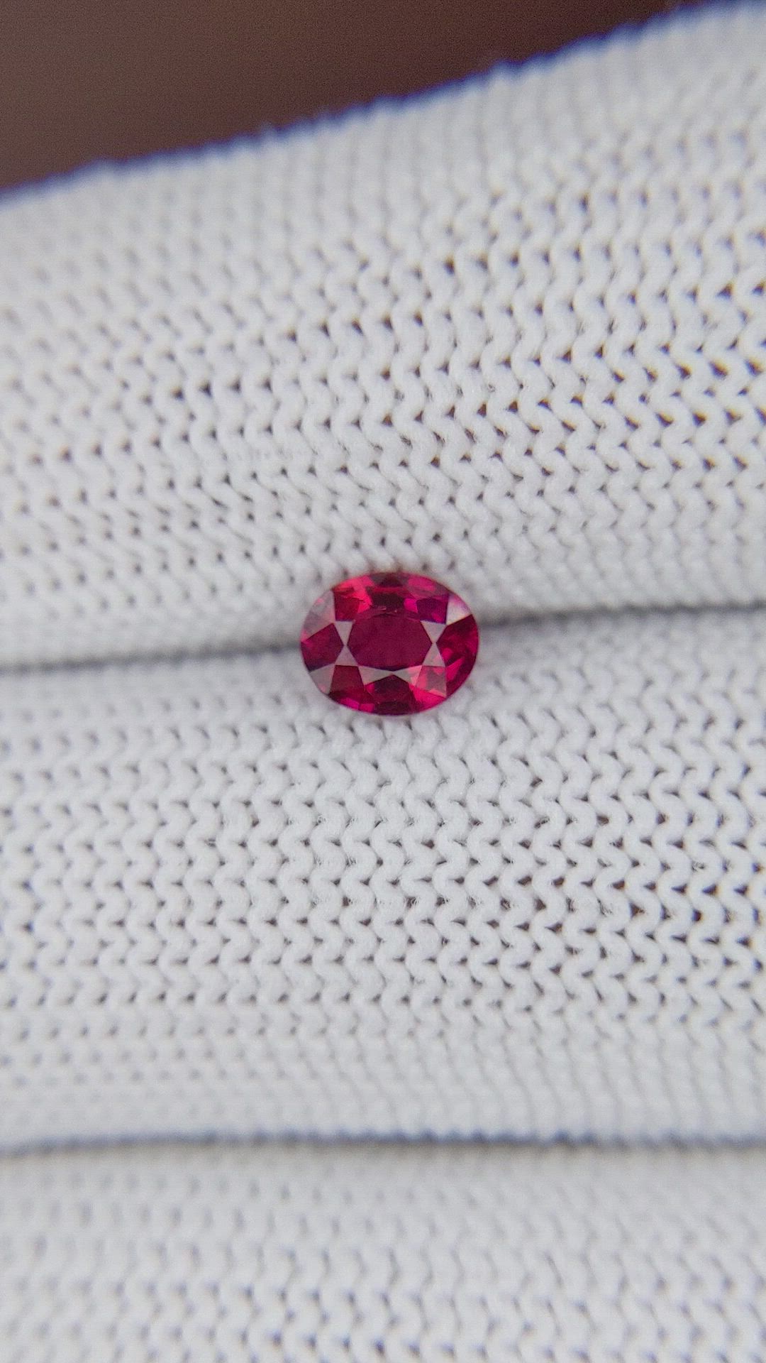 0.66 Ct. Pinkish Red Ruby from Mozambique Size Video