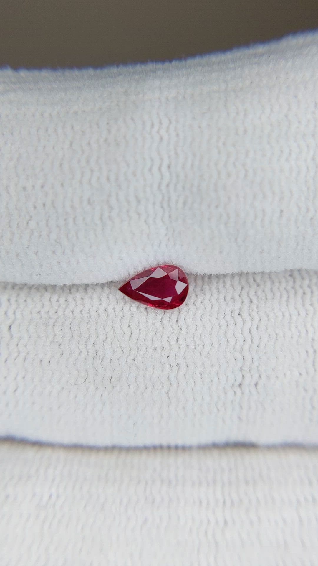 0.36 Ct. Pinkish Red Ruby from Mozambique Size Video