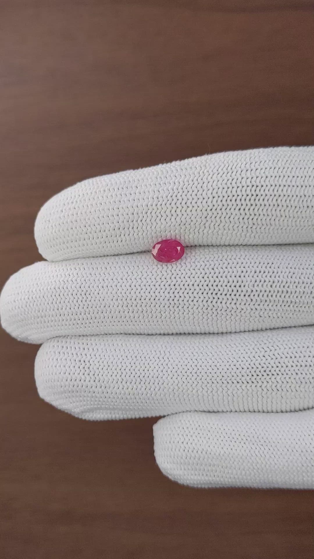 0.99 Ct. Pinkish Red Ruby from Madagascar Size Video